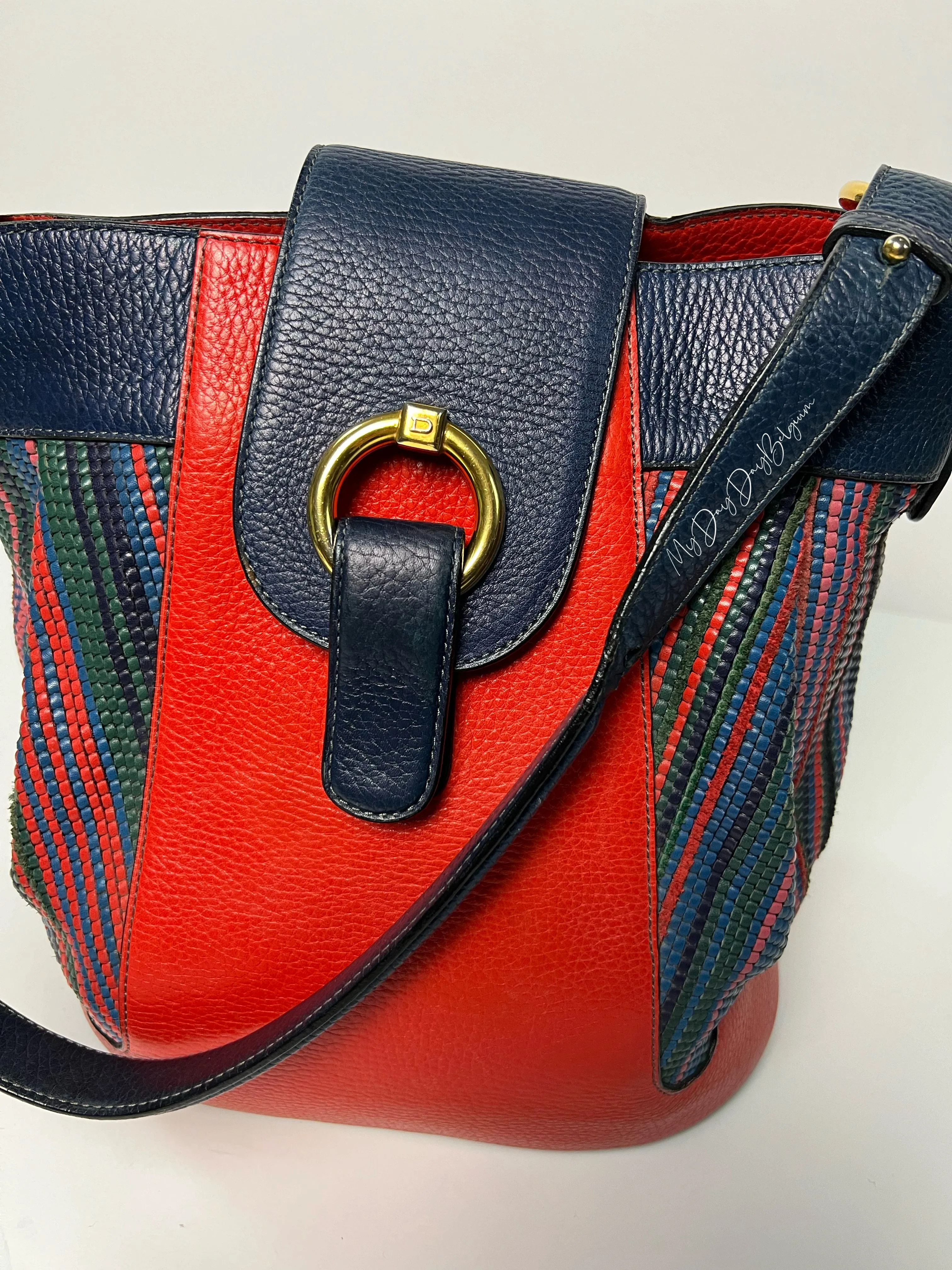 Delvaux vintage crossbody bag in orange red toile de cuir mid 90s