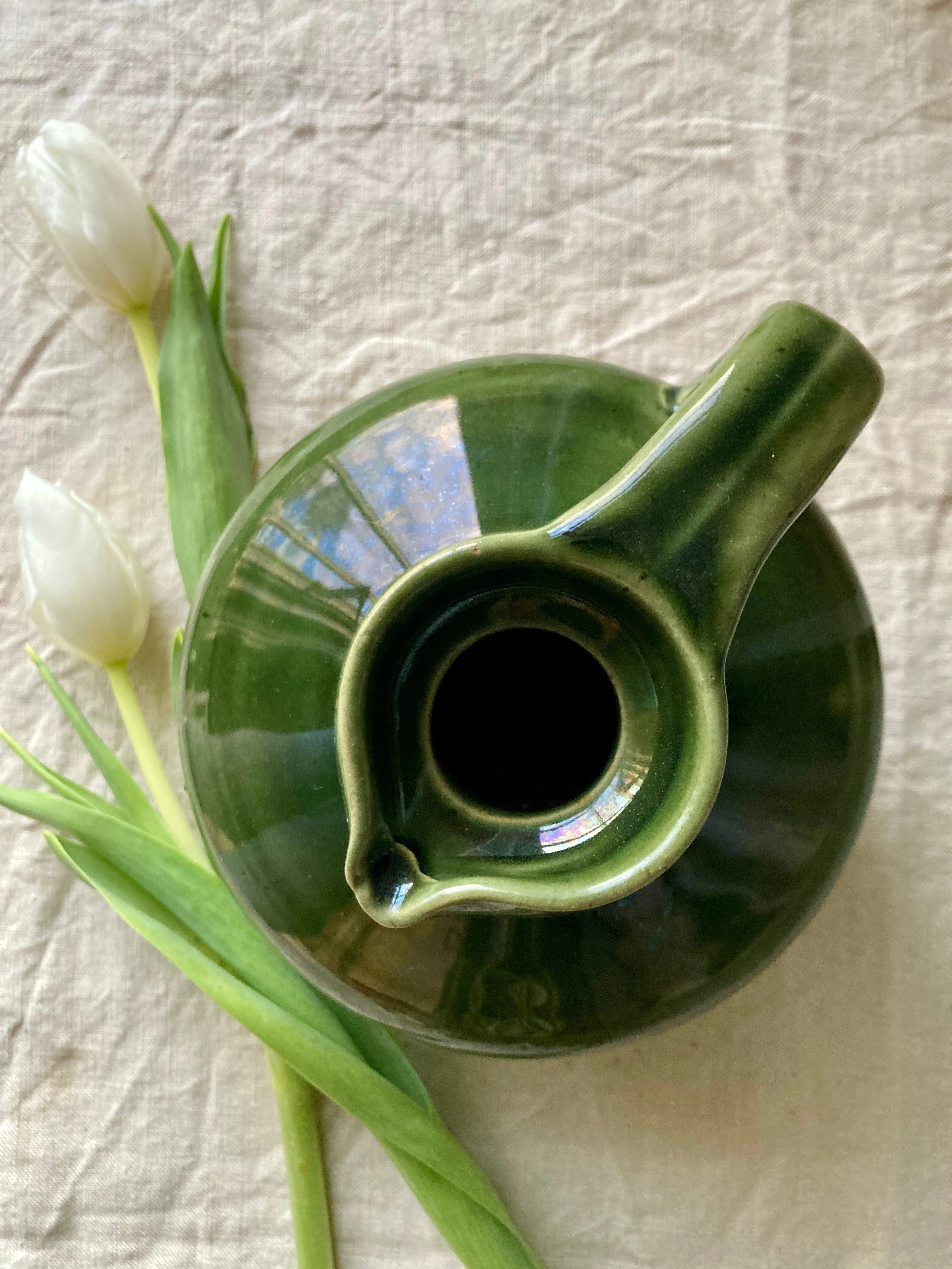 Green glazed stoneware flagon or jug by Govancroft